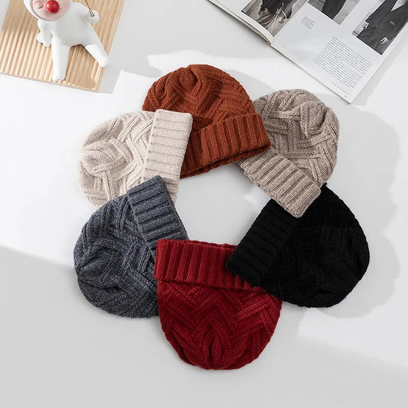 Wool knitted women's hat with dome crown in ankela red colour showing totem pattern details
