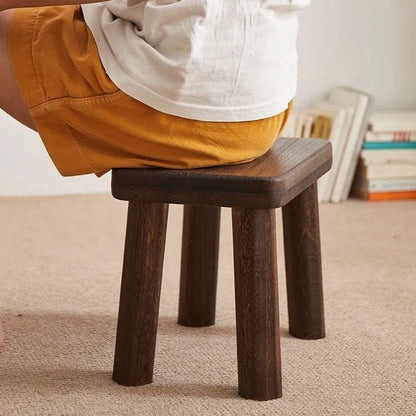 Solid wood stool with bracket structure and distressed finish for shoe changing