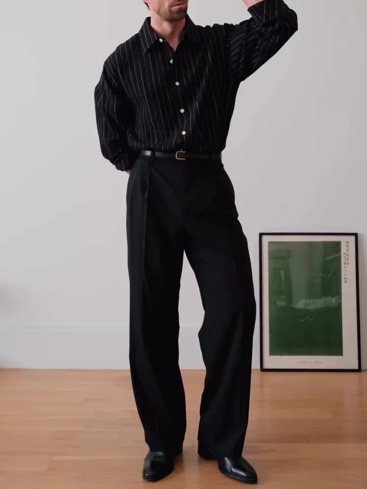 Men's black and white pinstripe long sleeve button down shirt with a regular fit.