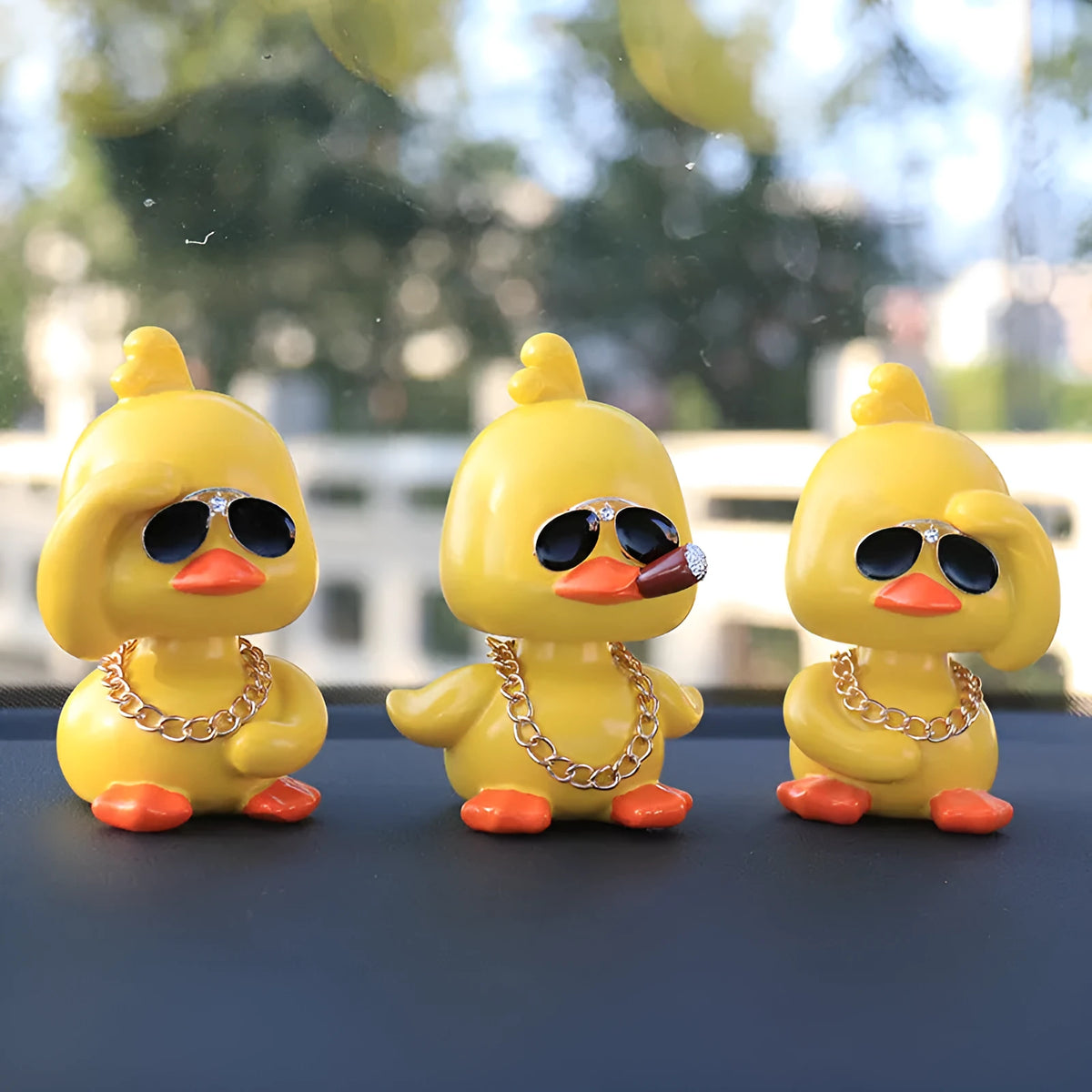 Little yellow duck resin car interior ornament in social duck poses with gold glasses and gold necklace