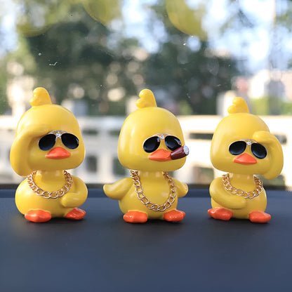 Little yellow duck resin car interior ornament in social duck poses with gold glasses and gold necklace