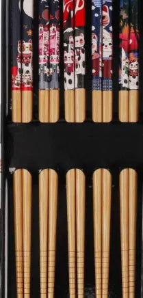 Set of five pairs of bamboo chopsticks showing lucky cat and chi ya blue pattern designs in gift box.