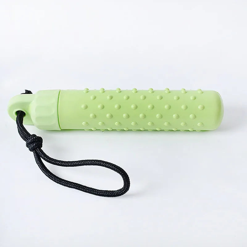 Two bright red and green floating TPR dog toys with ropes for water fetch and food hiding.