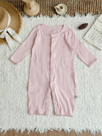Pure cotton baby romper in blue with long sleeves and single-breasted closure, showing long climbing style design