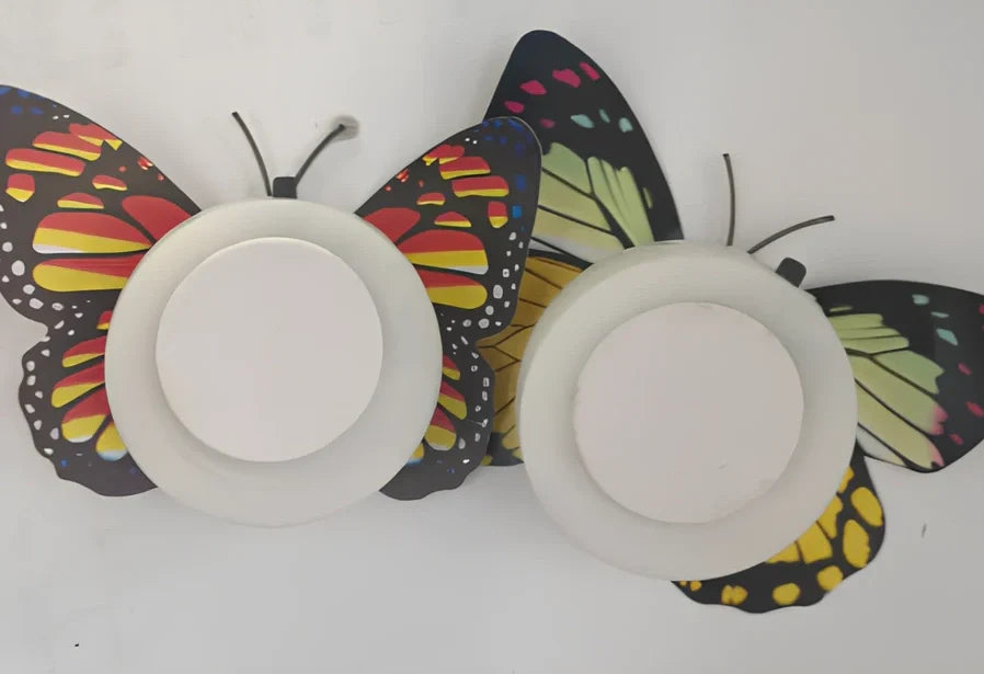 Set of 12 butterfly LED night lights with auto-changing colours and suction pads for wall mounting