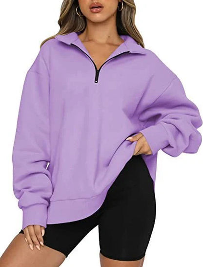 Women's zip turndown collar sweatshirt in various colors, showcasing loose fit and zipper detail.