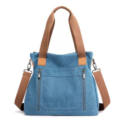 Women's canvas shoulder bag in various colors with large capacity and zipper closure