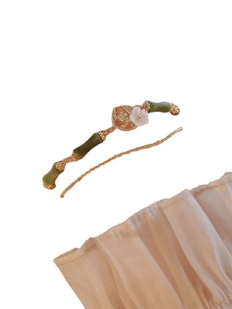 Natural olivine double layer bracelet with olive branch charms on wrist