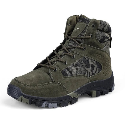 Men's black and camouflage high-top hiking shoes with PU upper and metal eyelets on a rocky outdoor path.