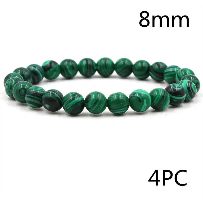 Elegant malachite stone bracelets with unique textures and patterns, perfect for a stylish accessory.