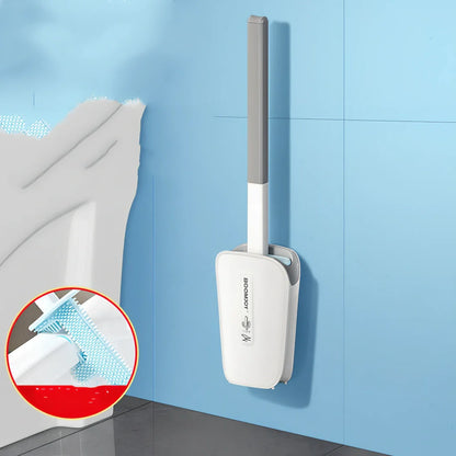 Blue toilet brush with angled TPR bristles in wall-mounted bucket for bathroom cleaning