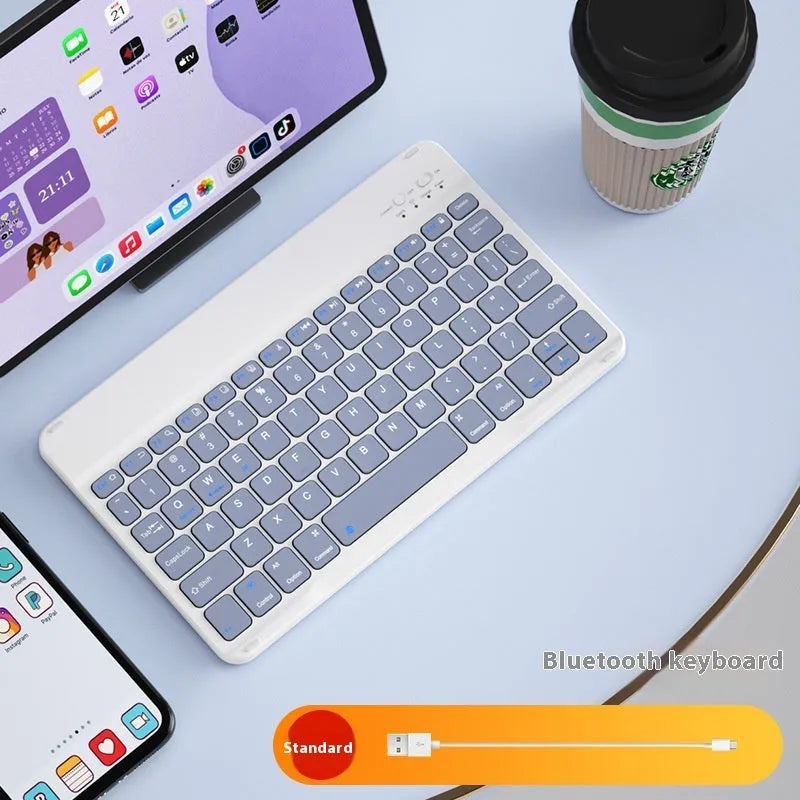 A wireless Bluetooth keyboard for tablets and PCs in a choice of colours including white, green, and pink.