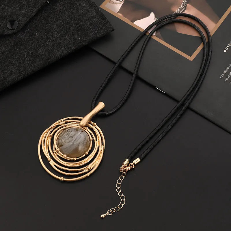Women's fashion OL vintage large round high-grade sweater chain necklace with plaid pattern geometry pendant made from alloy on a snakeskin wax rope chain extending from 51cm to 80cm