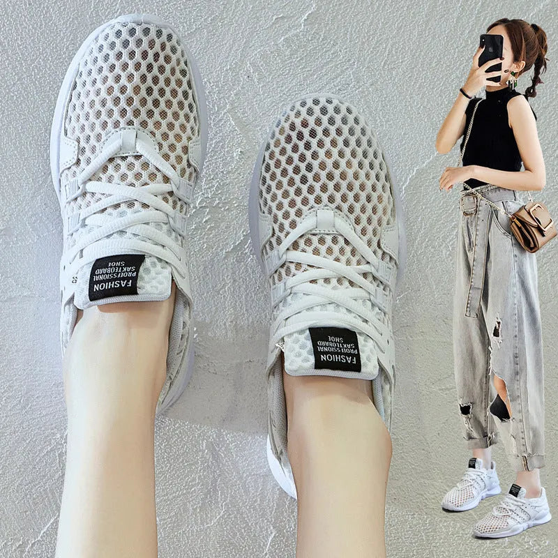 Low-top casual sneaker in mesh with hollow-out design and round toe.