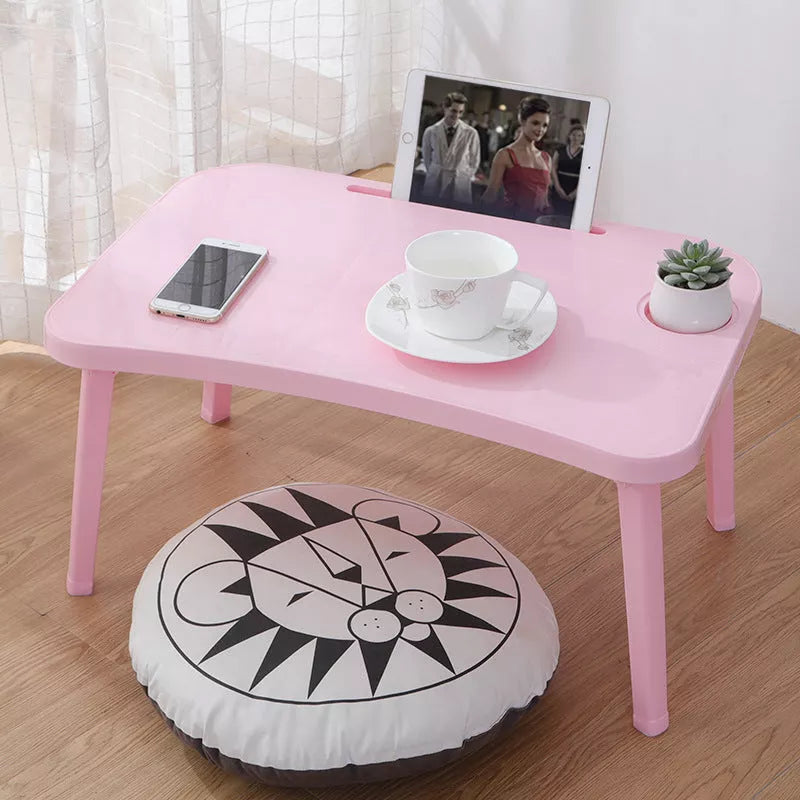 Foldable bed table in Nordic colors for portable computing