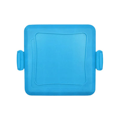 Red silicone baking tray with handbag-shaped mould and matching heat-resistant gloves on kitchen counter