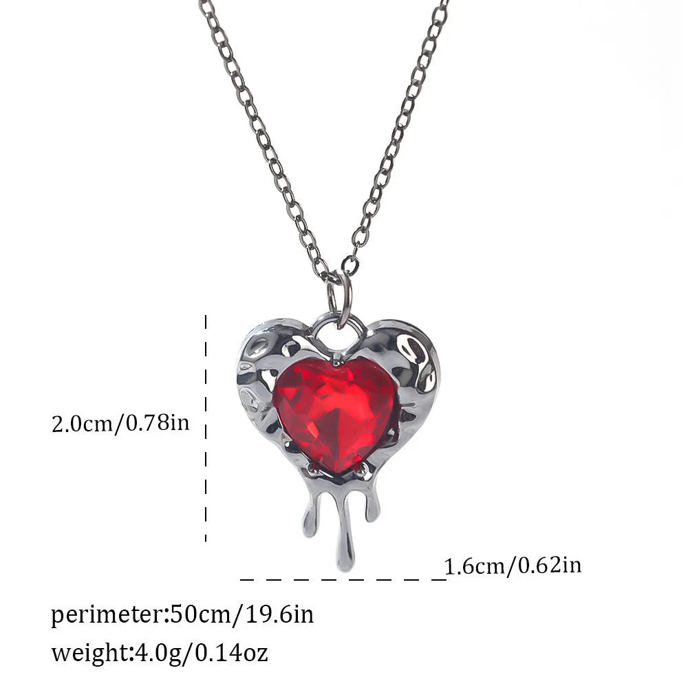 Gothic style zinc alloy necklace with bat pendant on a silver chain against dark background.