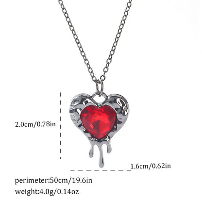Gothic style zinc alloy necklace with bat pendant on a silver chain against dark background.