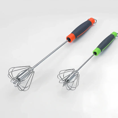 Stainless steel manual egg beater showing three size options with green and orange handles