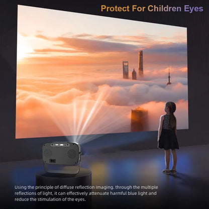 Black HD smart portable projector with remote control and cables on a table