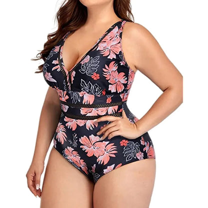 Black plus-size bikini swimsuit with print design and mesh fabric, shown on a hanger.