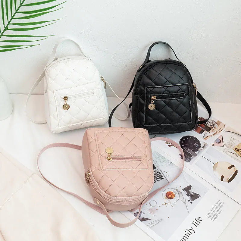 Girls' Korean style embroidered backpack in solid colour with hard PU construction and sandwich pocket