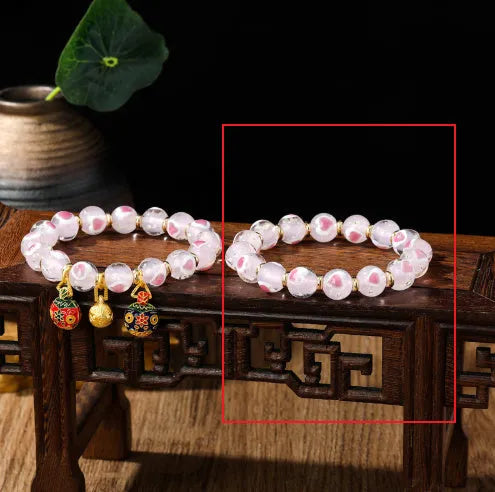 Handmade glass bracelet with 10mm swallowing gold beast cherry blossom heart charm in six colour options