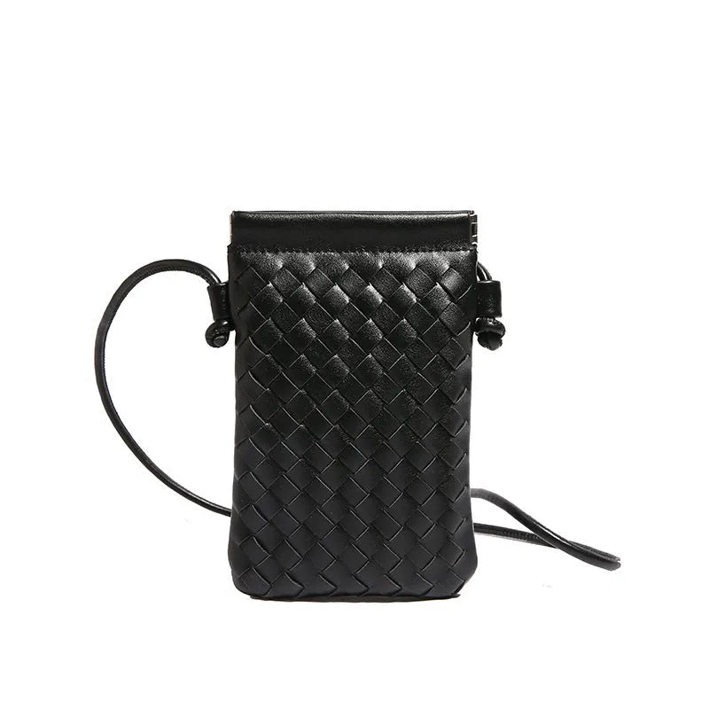 Vertical square vintage weave crossbody bag in multiple colours showing internal dark cell phone pocket.