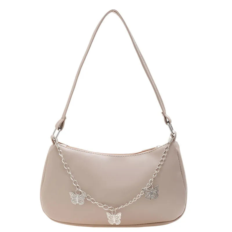 Women's black PU leather chain crossbody bag with butterfly clasp and structured square silhouette