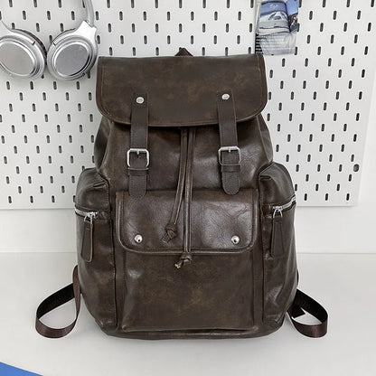 Large capacity PU travel backpack in black or brown with waterproof function and curved shoulder strap