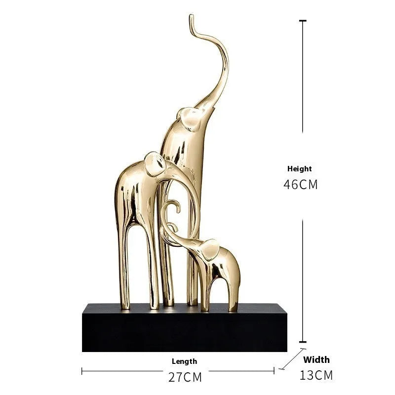 Fortune Bring Elephant resin decorative figurine in gold finish, 15cm tall on a wooden surface.