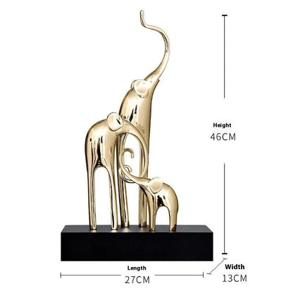 Fortune Bring Elephant resin decorative figurine in gold finish, 15cm tall on a wooden surface.