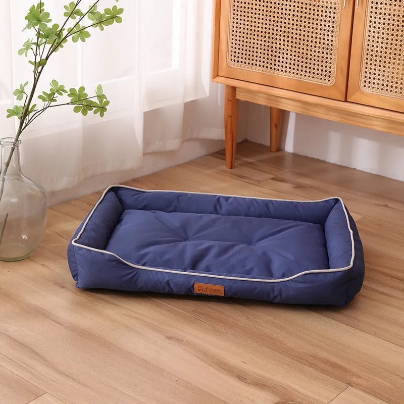 Grey waterproof Oxford cloth dog sofa bed on a wooden floor