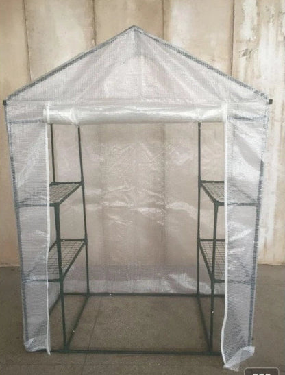 Green PE mesh greenhouse stand with steel frame measuring 143cm long by 73cm wide by 195cm tall