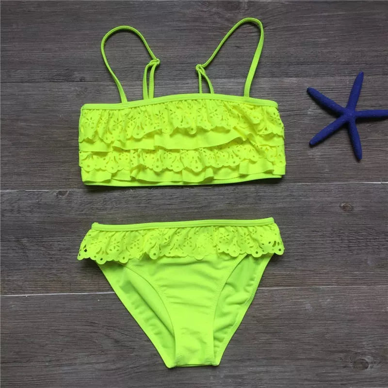 Girls' multilayer ruffle bikini swimsuit in vibrant colors for summer water activities