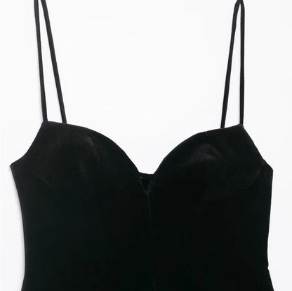 Black women's hooded dress with flared irregular hem, thin straps, and shirring detail on mercerised cotton knitted fabric