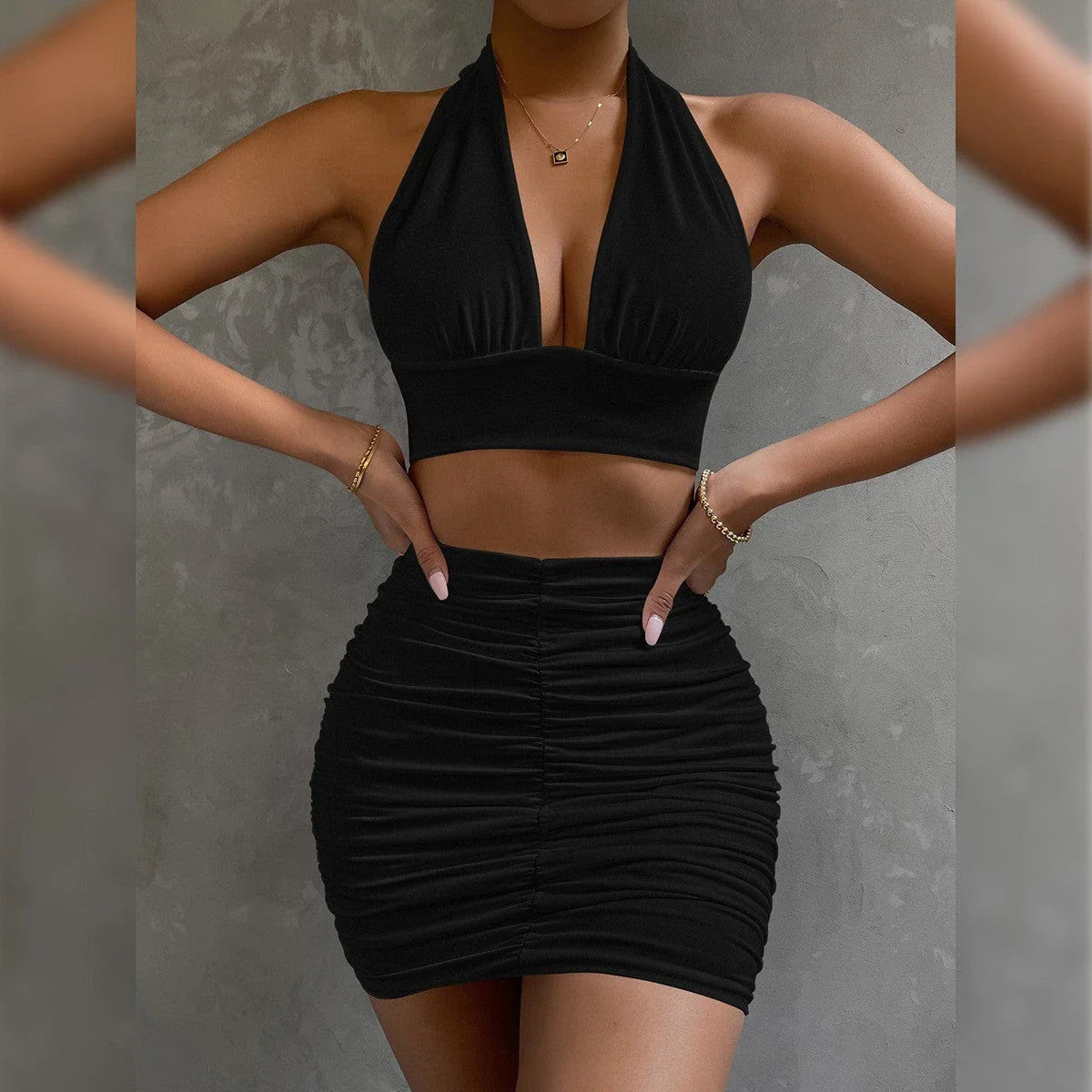 Stylish halter crop top with lace-up detail and pleated mini skirt set in various colors