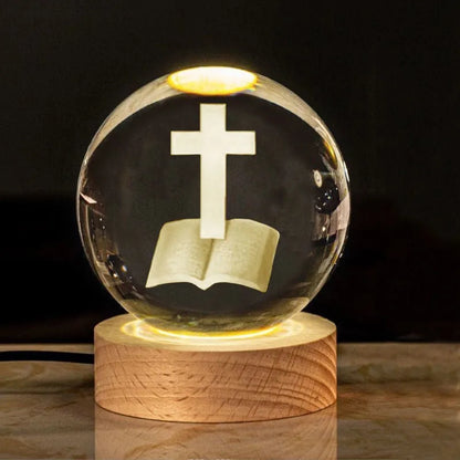 White crystal ball ornament with solid wood warm light base, showing purity engravings like Cross and Maria for desk decor