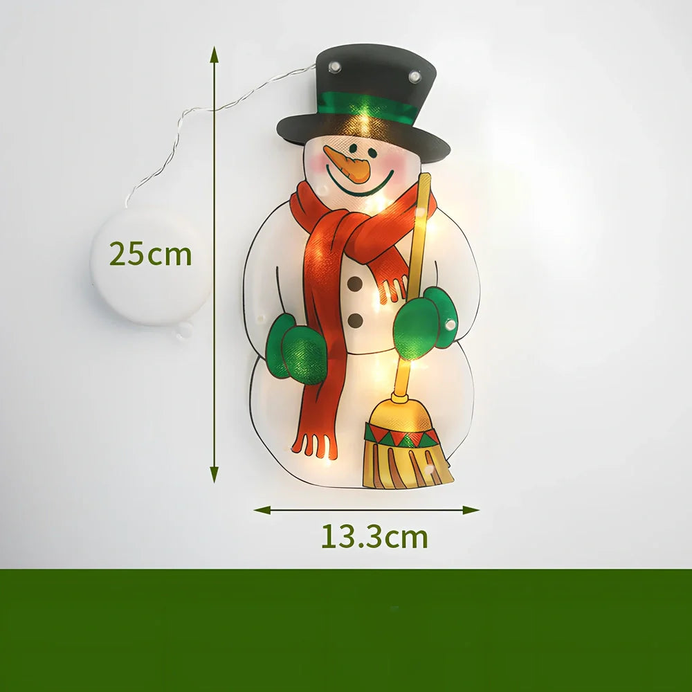 LED Christmas hanging lights with suction cups showing snowman design illuminated on window