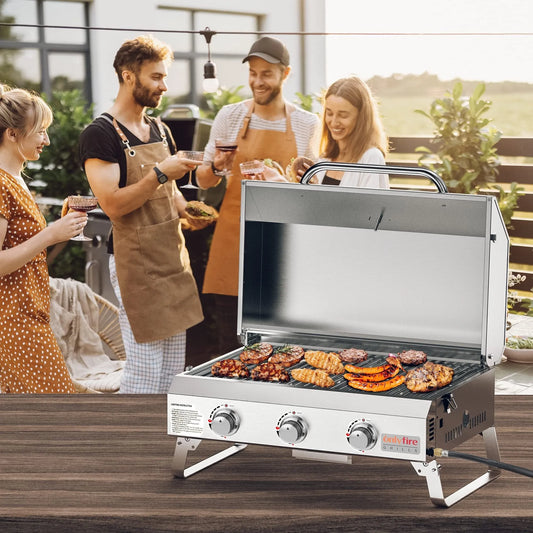 Silver stainless steel desktop gas barbecue grill with 3 burners and foldable legs