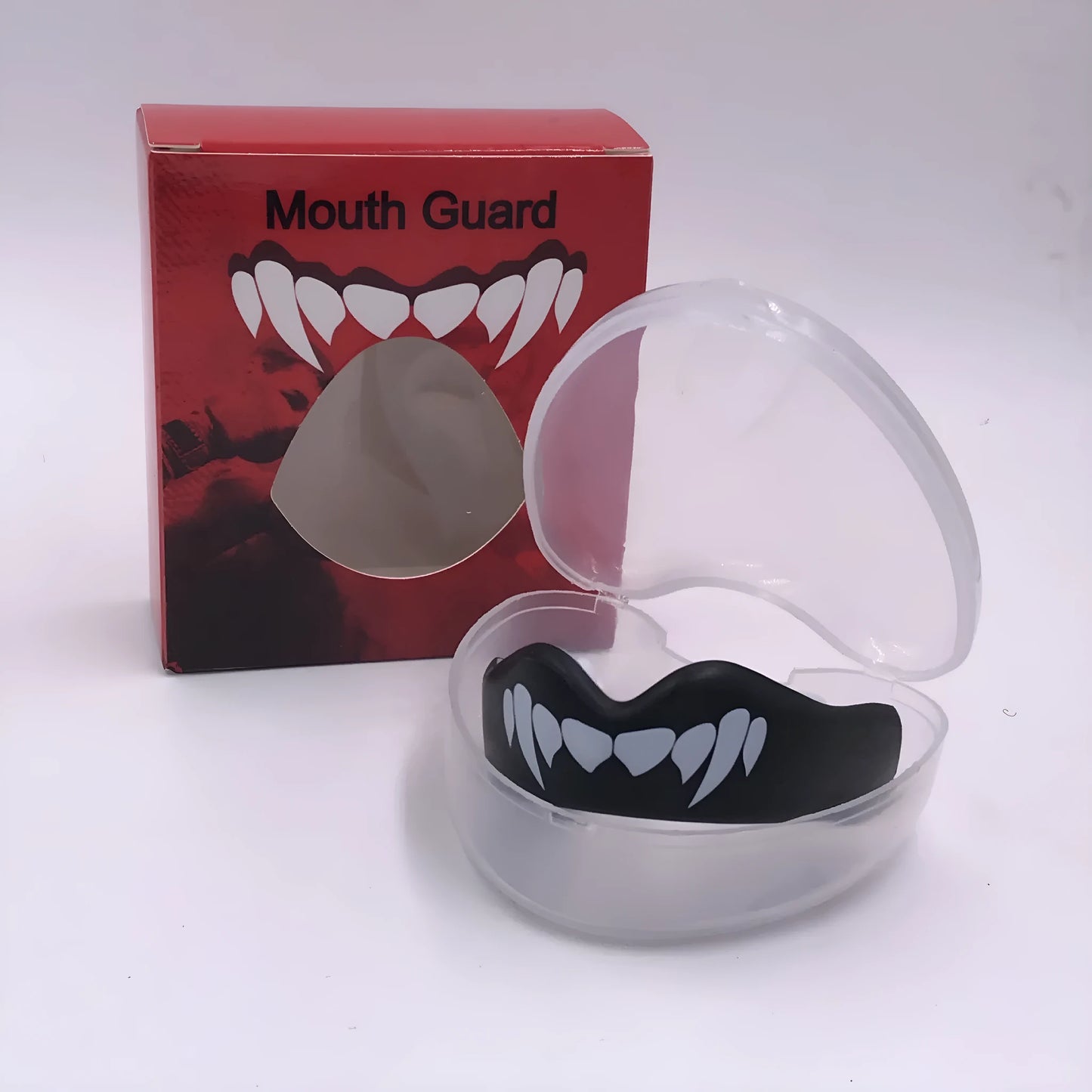 Custom mouldable boxing mouthguard with tooth socket design in black and white colour for adult combat sports.