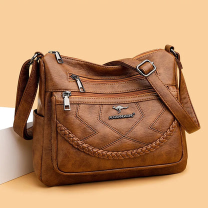 Soft leather fashion shoulder bag in horizontal square design with multiple internal pockets