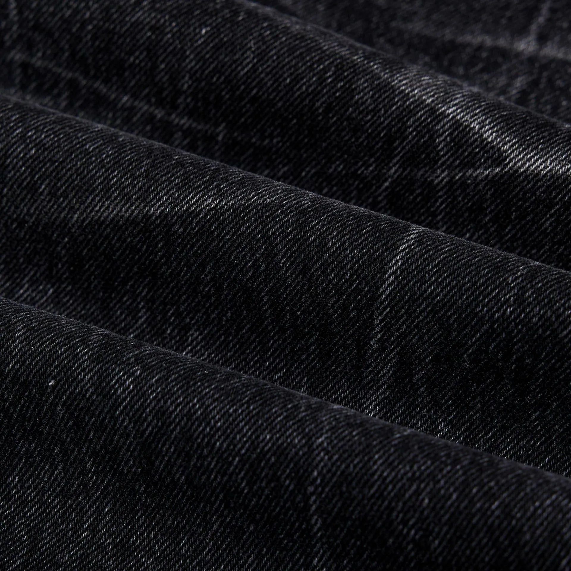 Black men's straight-leg jeans with an American washed old lightning crack distressed pattern.
