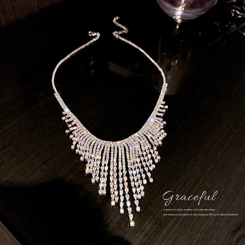 Silver tone tassel necklace with geometric alloy pendant and ball bead chain, 21-50cm circumference