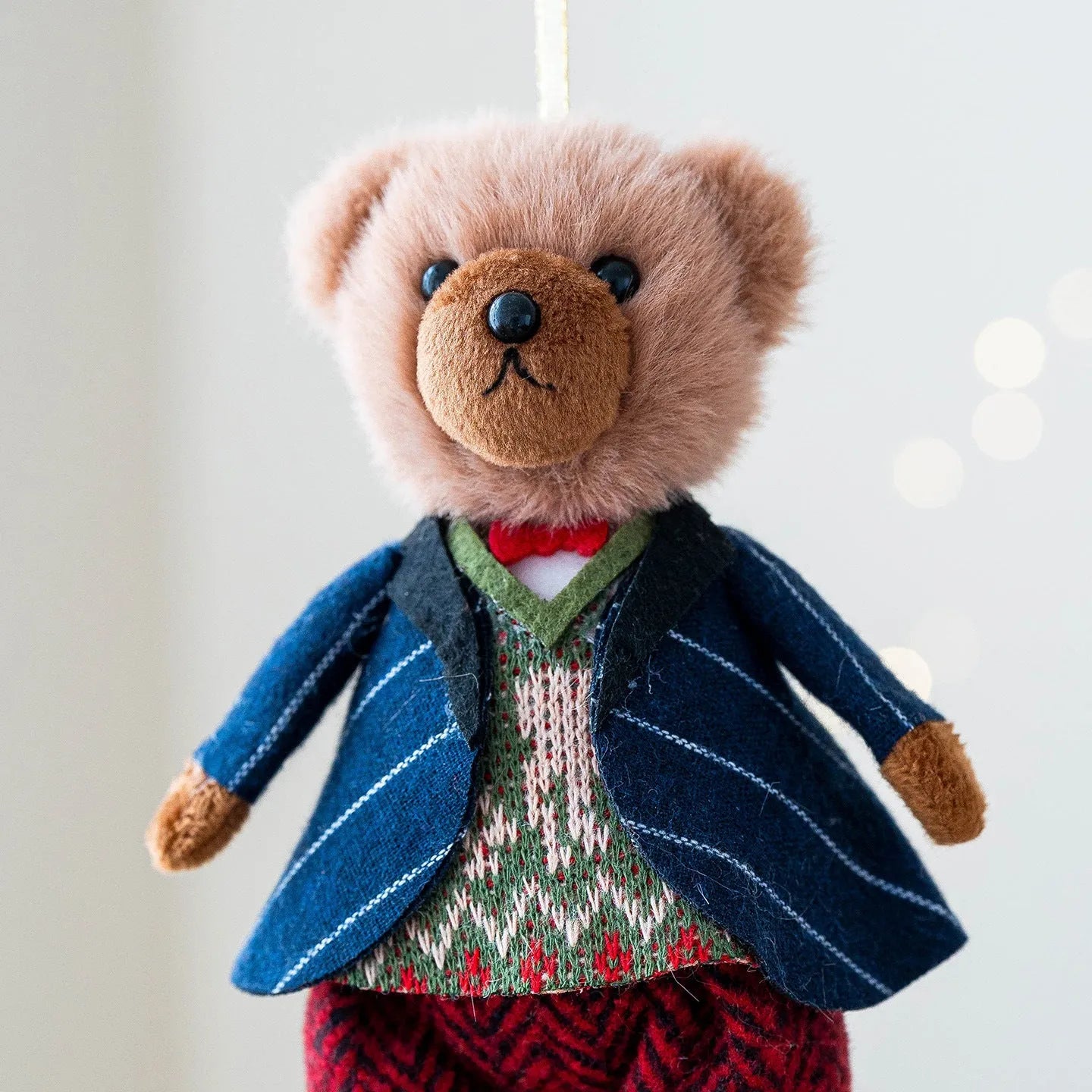 A cartoon-style plush bear doll in a cloth suit plaid design, shown in gentleman bear and princess bear variants.