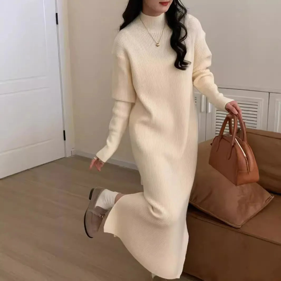 Half turtleneck knitting dress in graphite colour with overknee length and high waist design for commuting style.