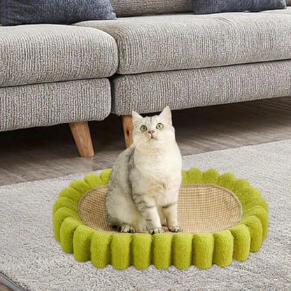 Green oval-shaped sisal cat scratching pad with a central bowl, serving as a cat bed and furniture protector.