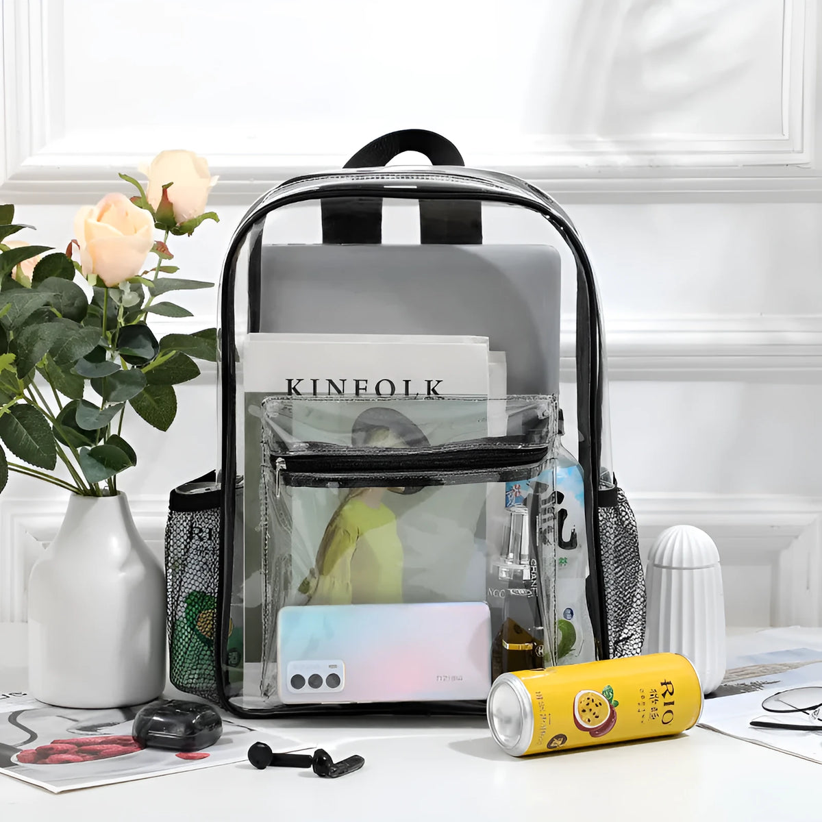 Transparent PVC travel backpack showing contents through clear material with 50 litre capacity