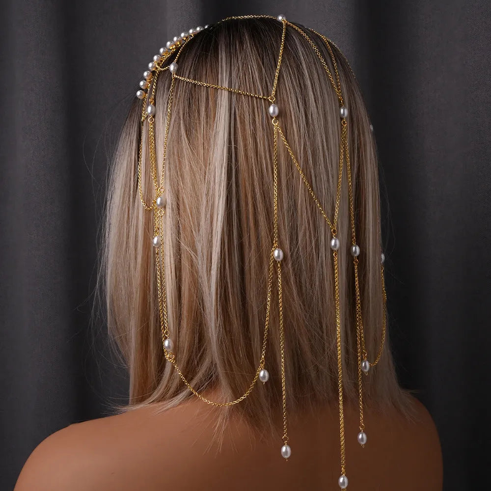 Women's pearl hair chain with gold electroplated finish and tassel detailing for office wear