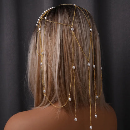 Women's pearl hair chain with gold electroplated finish and tassel detailing for office wear